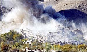 The ruins of Kabul smoke after one of the US bombing raids.